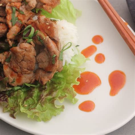 korean-style-pork-wraps-with-chili-sauce-emerilscom image