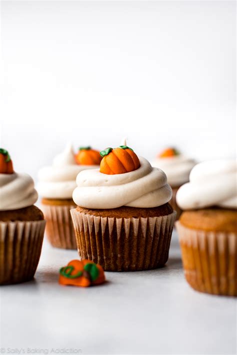 pumpkin-cupcakes-with-cream-cheese-frosting image