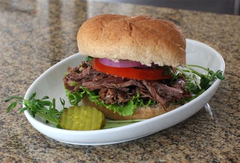 slow-cooker-italian-beef-and-beer-recipe-the-spruce image