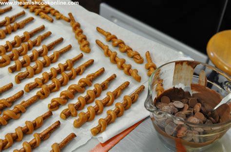 caramel-wrapped-chocolate-dipped-pretzels image