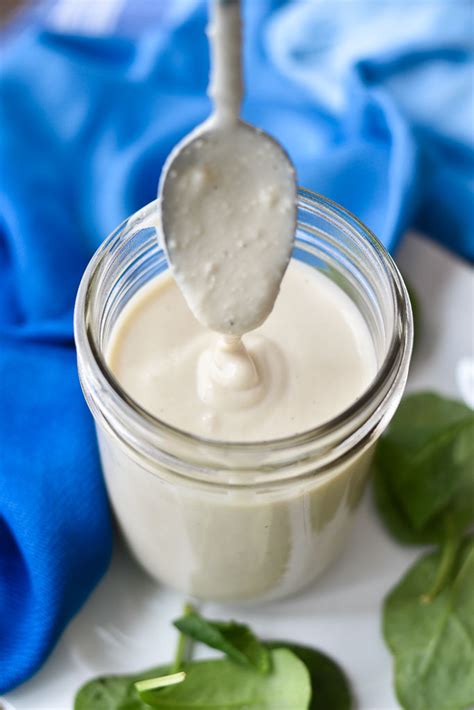 creamy-parmesan-dressing-with-two-spoons image