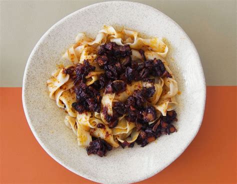 hand-pulled-noodles-with-spicy-sour-mussel-xo-sauce image