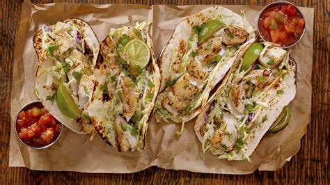 the-secret-to-extra-delicious-grilled-fish-tacos-gq image