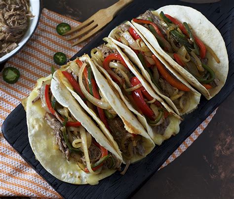 slow-cooker-brisket-tacos-pints-and-plates image