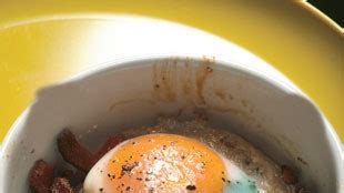 baked-eggs-with-bacon-and-spinach-recipe-bon-apptit image