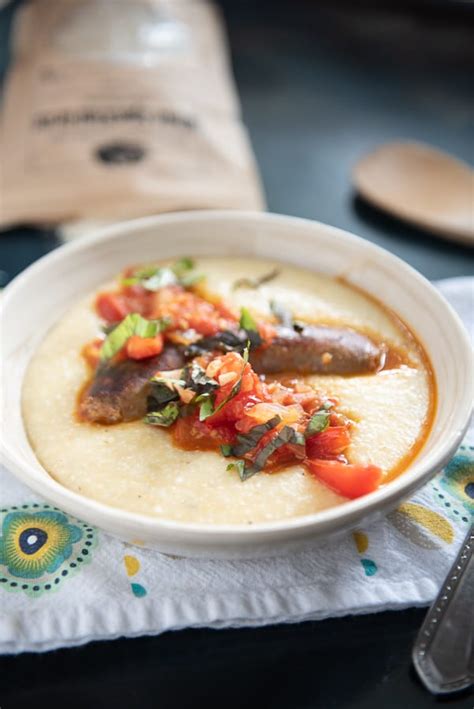 cheddar-cheese-grits-with-italian-sausage-two-lucky image