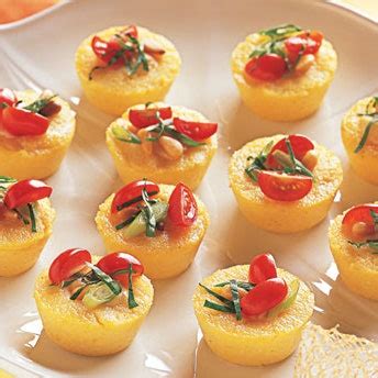 polenta-bites-with-blue-cheese-tomatoes-and-pine-nuts image