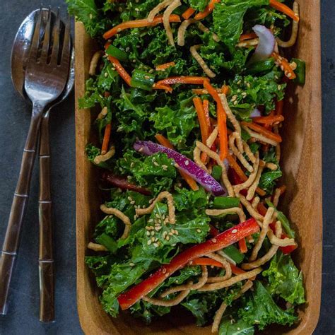 kale-salad-with-sesame-dressing-recipe-emily-farris-food-wine image