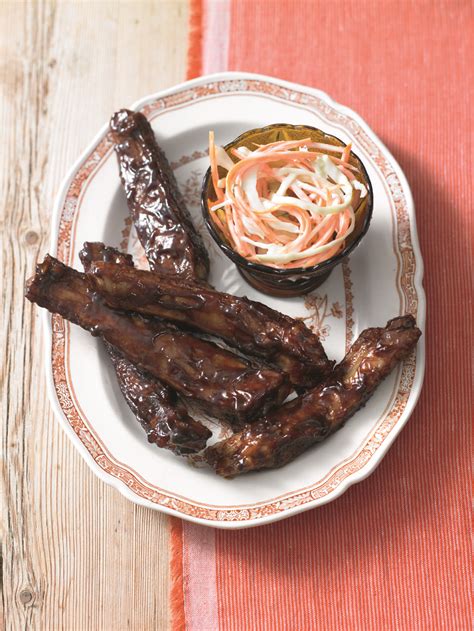 sticky-hoisin-pork-ribs-with-coleslaw-recipe-delicious-magazine image