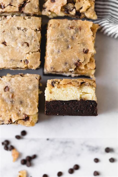 brownie-bottom-cookie-dough-cheesecake-bars-handle image