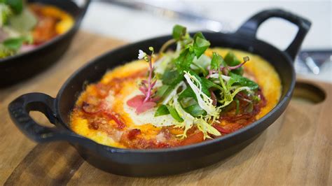 italian-baked-eggs-with-polenta-and-tomato-sauce image