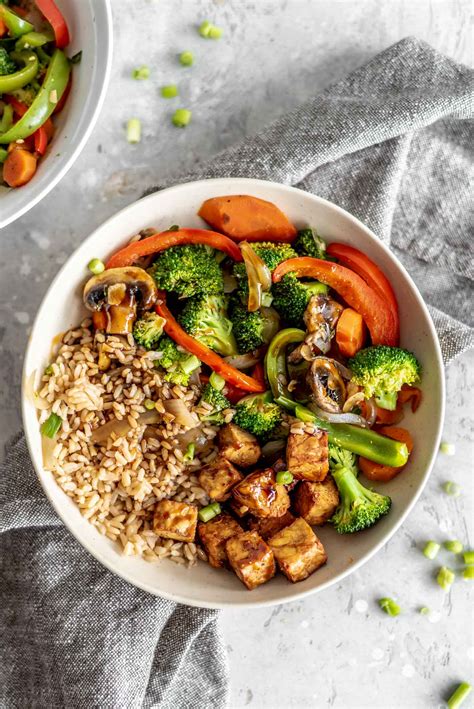veggie-stir-fry-with-tempeh-and-rice-running-on-real image