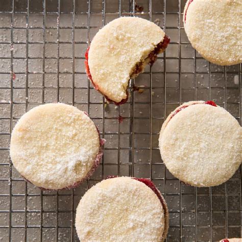 almond-raspberry-sandwich-cookies-americas-test image
