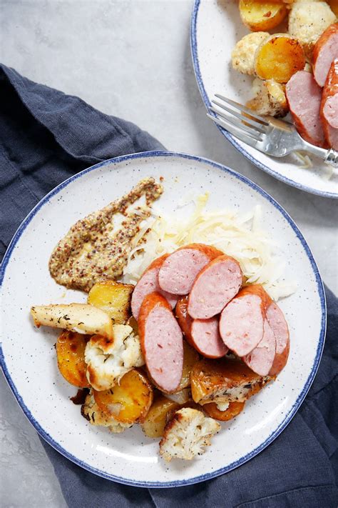 sheet-pan-kielbasa-sausage-and-sauerkraut-dinner image