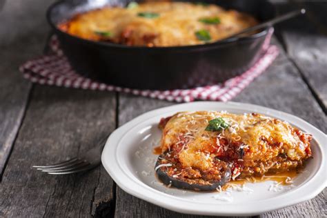 hearty-eggplant-parmesan-the-daily-meal image