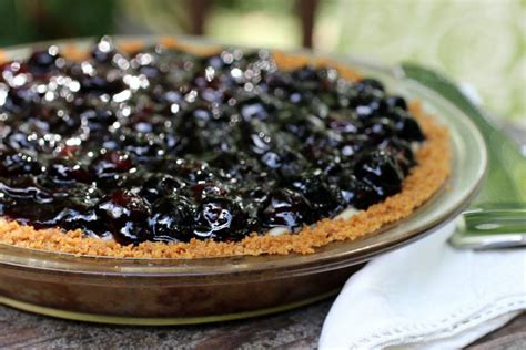 elderflower-cream-pie-with-blueberries-and-elderberries image