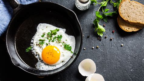 why-you-should-be-frying-eggs-in-olive-oil-tasting-table image