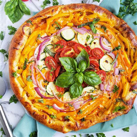 rainbow-veggie-pizza-recipe-eatingwell image