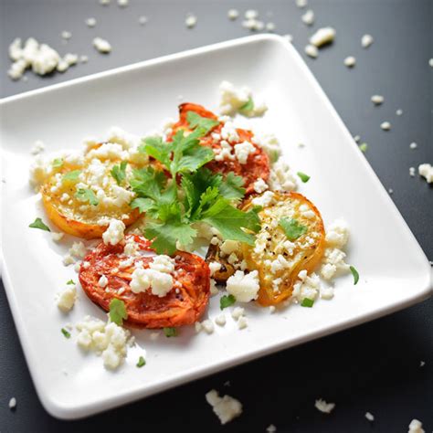 oven-roasted-plum-tomatoes-with-queso-fresco-simple-seasonal image