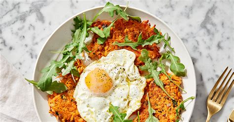 sweet-potato-rsti-with-fried-eggs-and-greens image