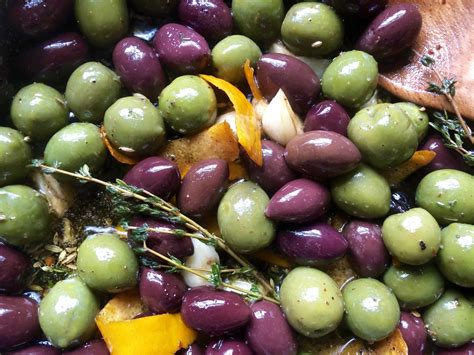 ina-gartens-warm-marinated-olives-a-hint-of-rosemary image