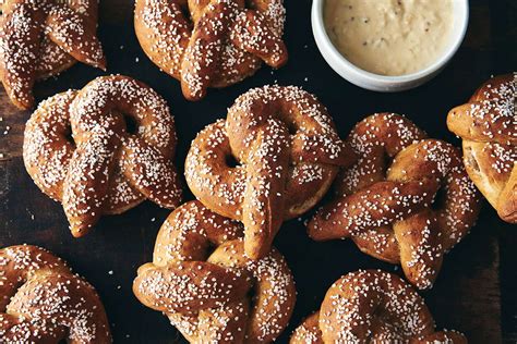 rye-pretzels-with-cheesy-beer-sauce-king-arthur-baking image