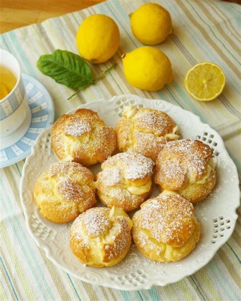 profiterole-cream-puffs-with-creamy-lemon-curd image