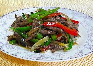 stir-fried-beef-with-onions-and-peppers image