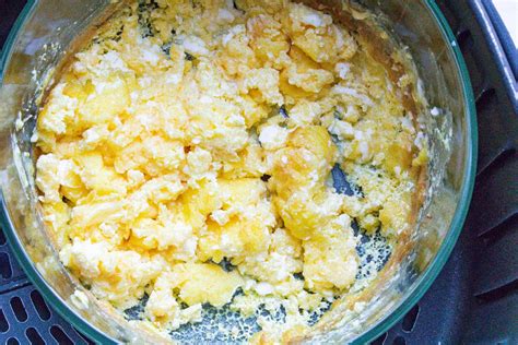 perfectly-cooked-scrambled-eggs-in-air-fryer-savory image