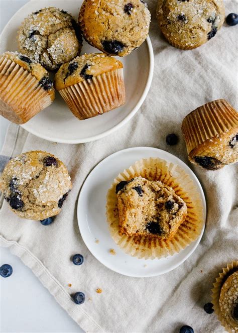 whole-wheat-blueberry-muffins-wood-spoon image