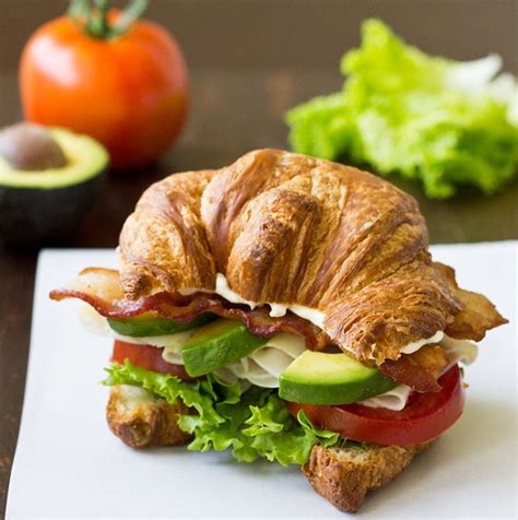 turkey-avocado-blt-croissant-sandwich-by-culinaryhill image