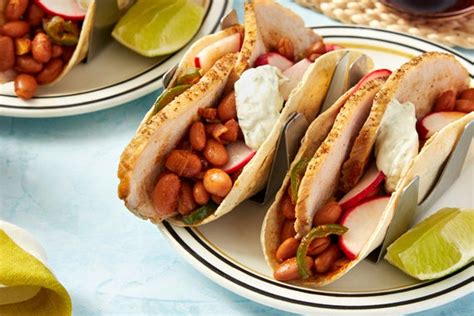 roasted-pork-tacos-with-spicy-pinto-beans-lime image