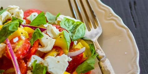 tomato-mango-salad-with-basil-and-feta-recipe-food image