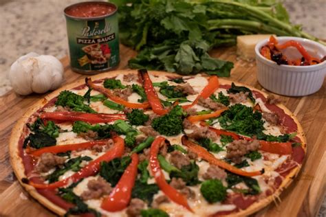 broccoli-rabe-sausage-and-roasted-red-pepper-pizza image