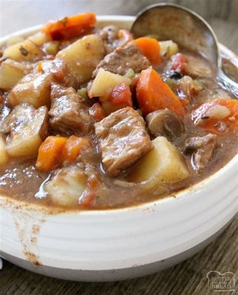 best-slow-cooker-beef-stew-butter-with-a-side-of-bread image