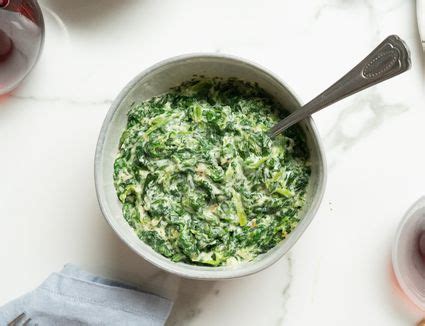 baked-rice-with-spinach-and-parmesan-cheese-the image