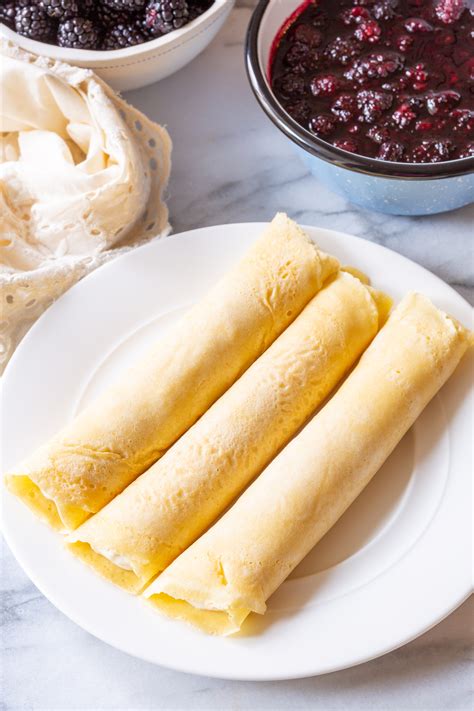 blintz-pancakes-with-blackberry-sauce-recipe-a-spicy image