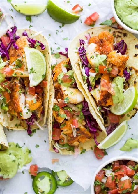 epic-baja-fish-tacos-with-homemade-fish-taco-sauce-joyful image