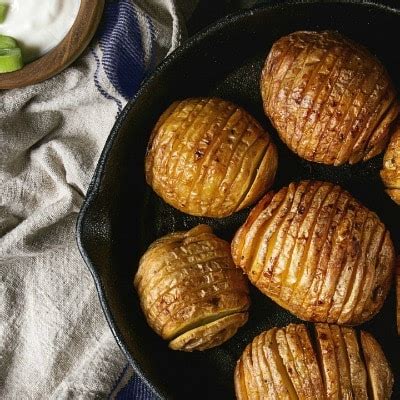 easy-baked-hasselback-potatoes-must-love-home image