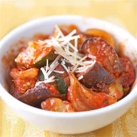 eggplant-zucchini-parmesan-recipe-eatingwell image