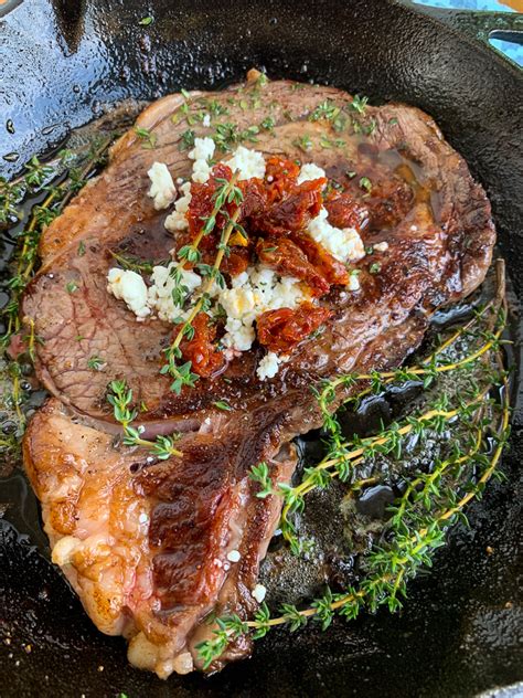 pan-seared-ribeye-steaks-with-goat-cheese-and-sun image