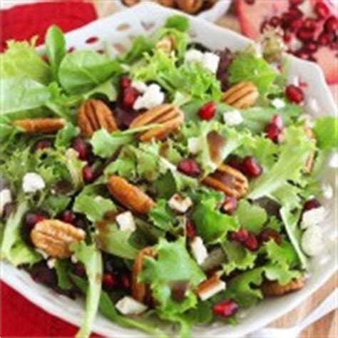 mixed-green-salad-with-pomegranate-seeds-feta-and image