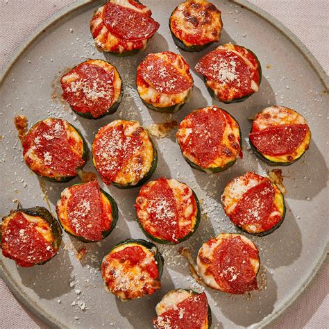 zucchini-pizza-bites-eatingwell image