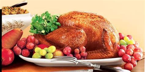 roast-turkey-with-pomegranate-sauce-countrylivingcom image