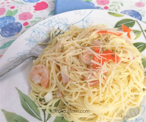 simple-and-delicious-garlic-white-wine-seafood-pasta image