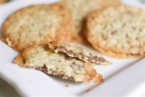 chocolate-lace-sandwich-cookies-a-hint-of-rosemary image
