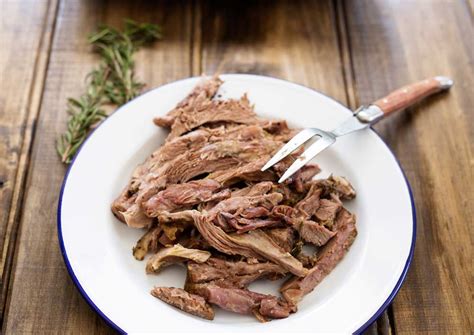 slow-roasted-lamb-with-anchovy-and-rosemary image