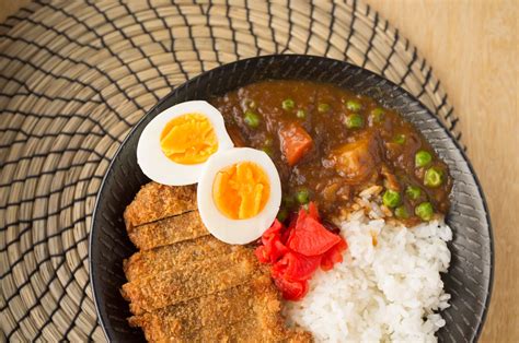 pork-cutlet-with-curry-sauce-pork-katsu-kare-asian image