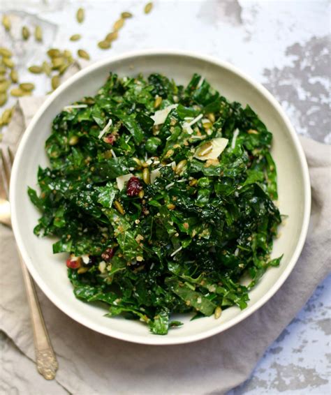 kale-salad-with-cranberries-and-pepitas-happily-from image