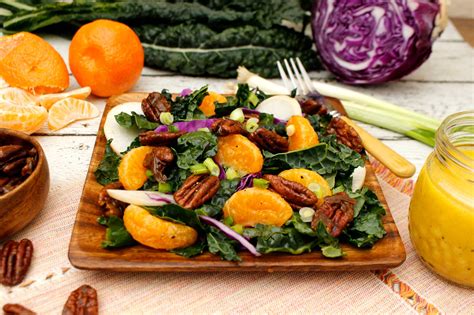 mandarin-orange-and-kale-salad-with-candied-pecans image